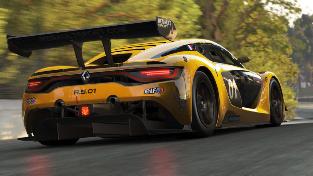 Yellow Renault Sport RS 01 race car speeding on winding road through lush green forest wallpaper