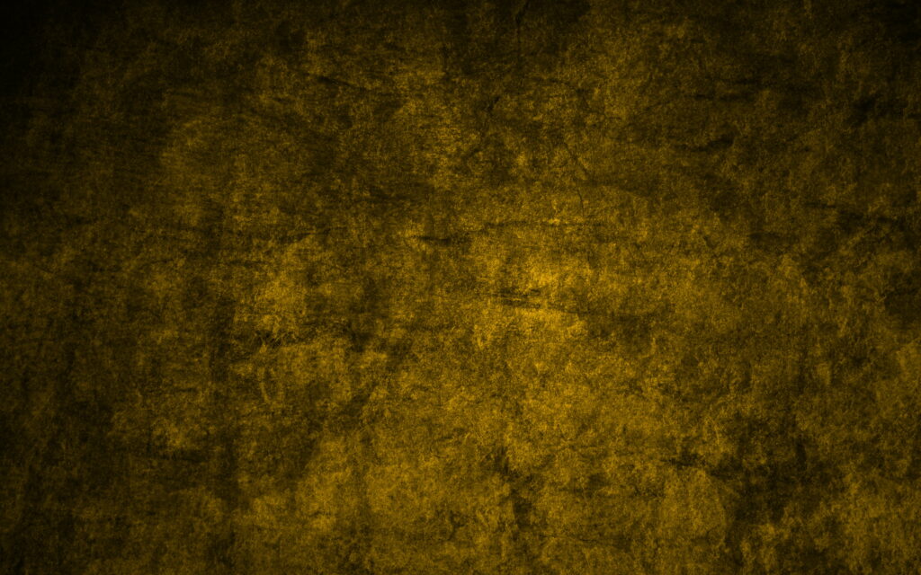 Golden Elegance: A Captivating 4K Wallpaper of Textured Stone Wall on Vibrant Yellow Background