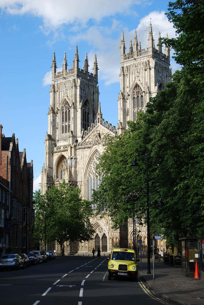 Charming York Minster Cathedral: Tree-Lined Street Wallpaper