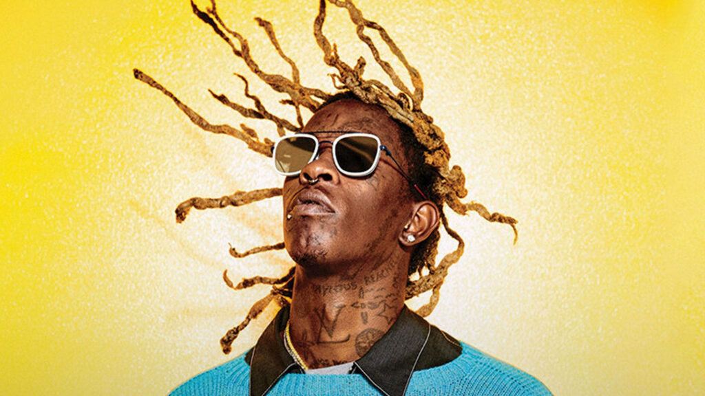 Young Thug Wallpaper: Fierce Style & Sunglasses on Vibrant Yellow