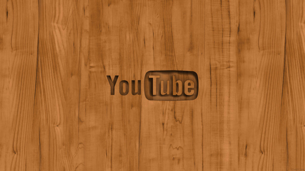 Youtube Logo Immersed in Rustic Wood Background Wallpaper