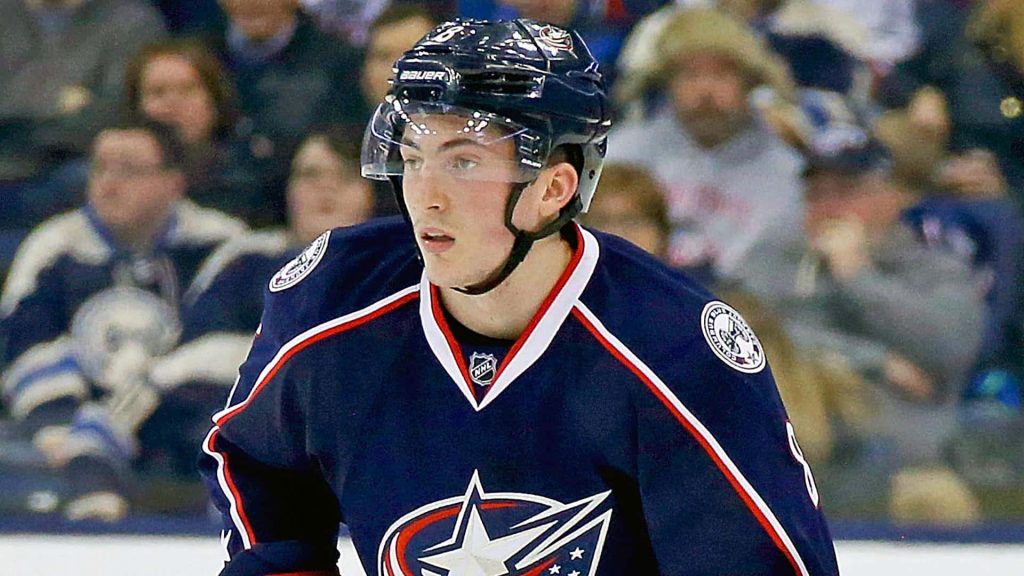 NHL defenseman Zach Werenski in Columbus Blue Jackets jersey 4k wallpaper intense game shot