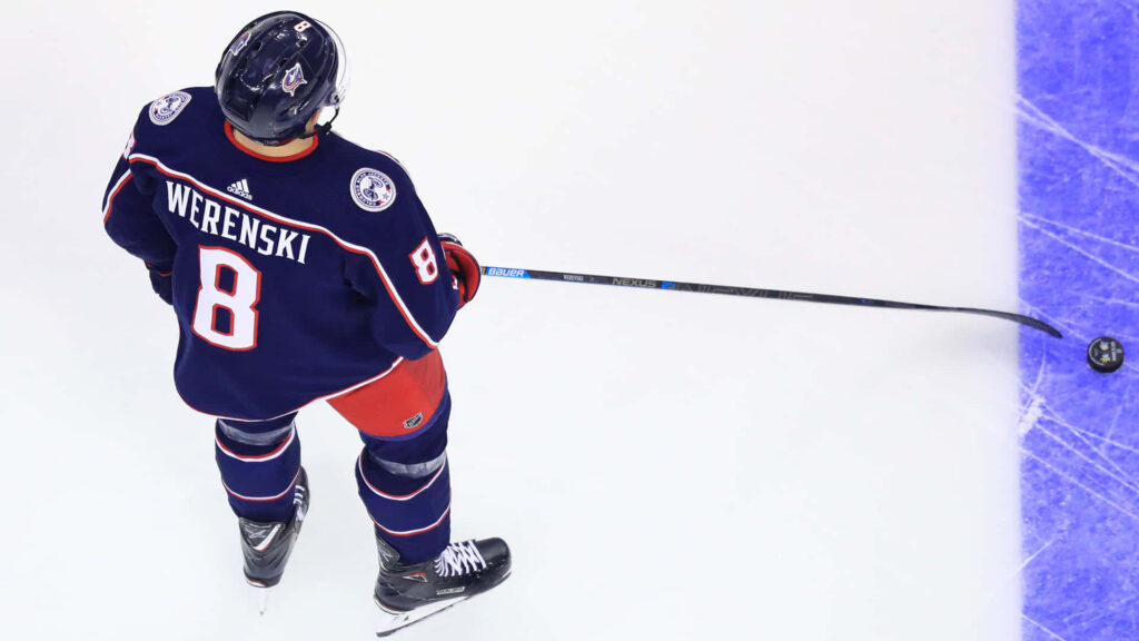 Zachary Werenski Columbus Blue Jackets hockey player in number 8 jersey on ice dynamic wallpaper