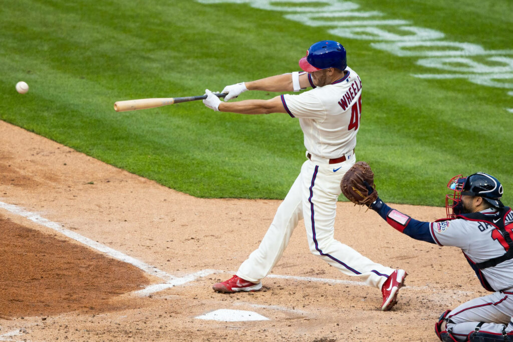 Zack Wheeler in Action: Confident Batting Skills Wallpaper Background