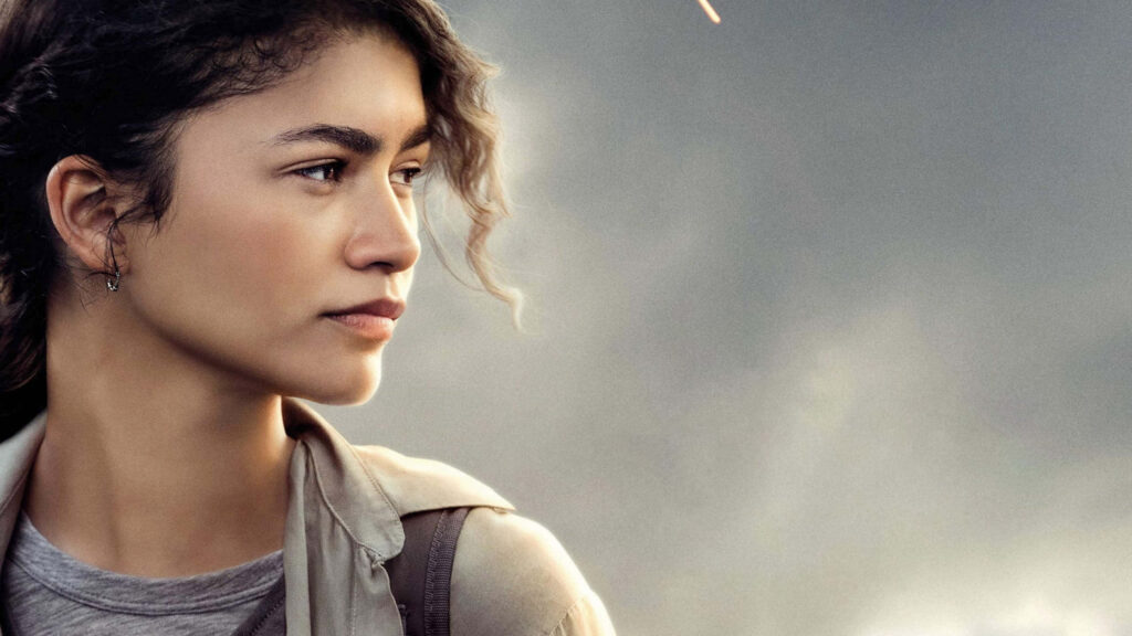 Close-up profile of Zendaya with soft natural background expressive thoughtful look HD wallpaper