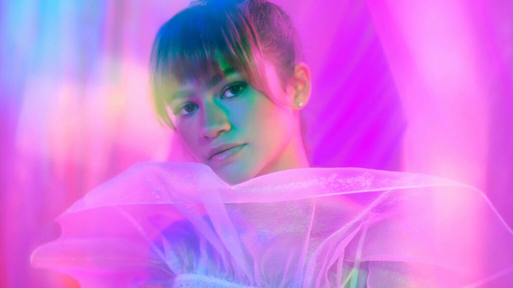 Zendaya as Rue in Euphoria HBO wallpaper with vibrant neon pastel dreamy ethereal lighting background