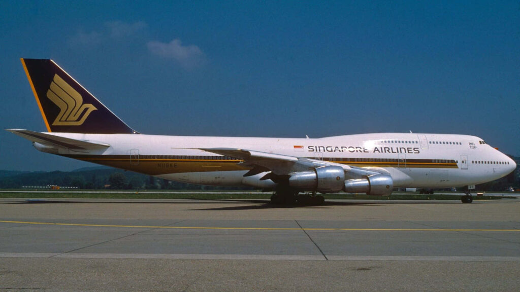 Jumbo Jet on Runway Background Wallpaper