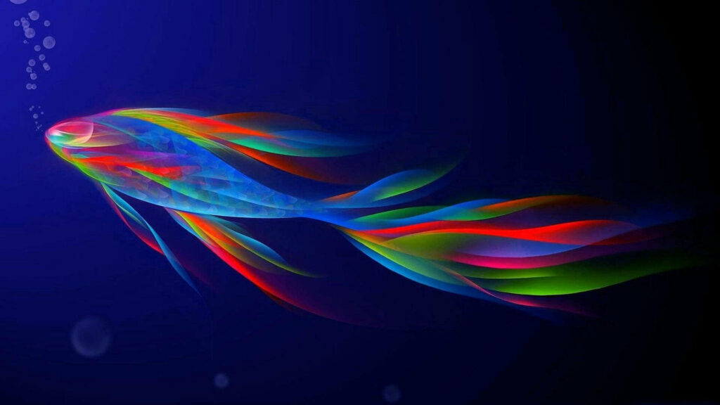 Radiant rainbow fish wallpaper with colorful fluid ribbons swimming in dark blue abyss background