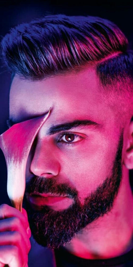 Virat Kohli high resolution wallpaper vibrant colors dramatic lighting modern portrait background