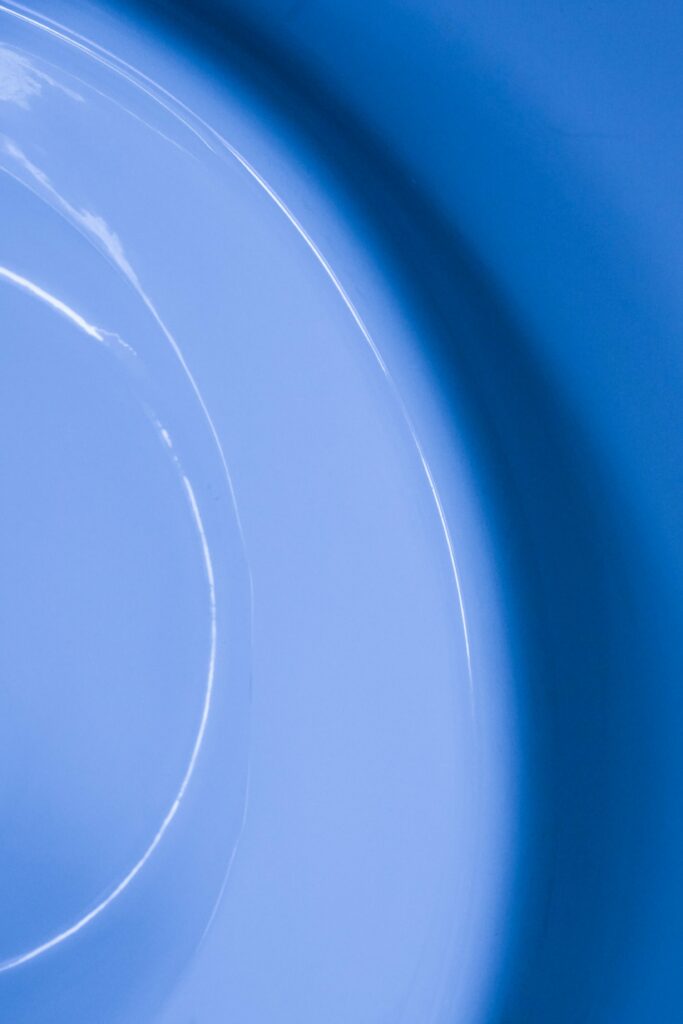 Calming Blue Swirling Wallpaper: Hypnotic Fluid Paint Design
